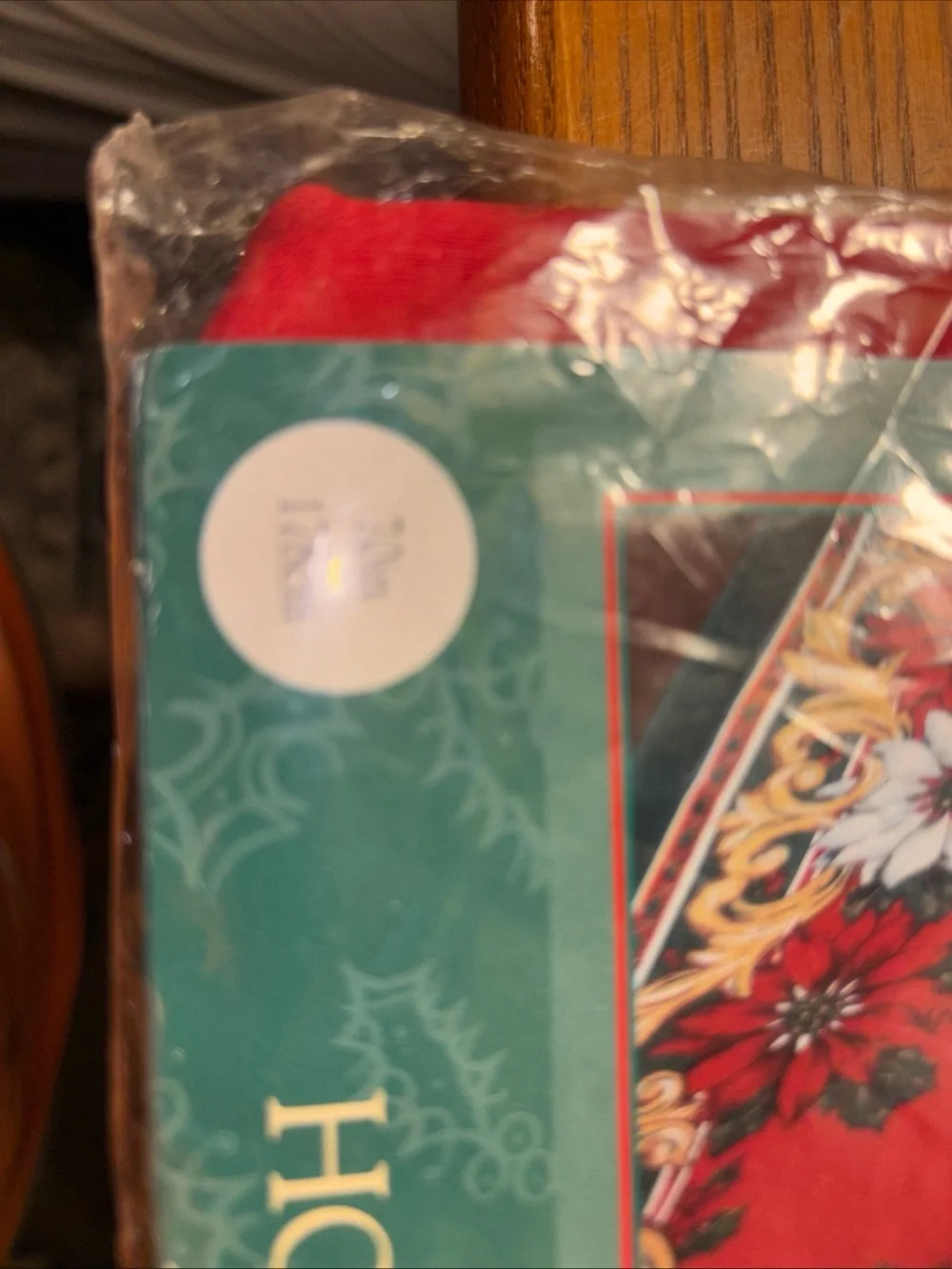 Holiday Red Tablecloth with Poinsettia and Holly Border 70”